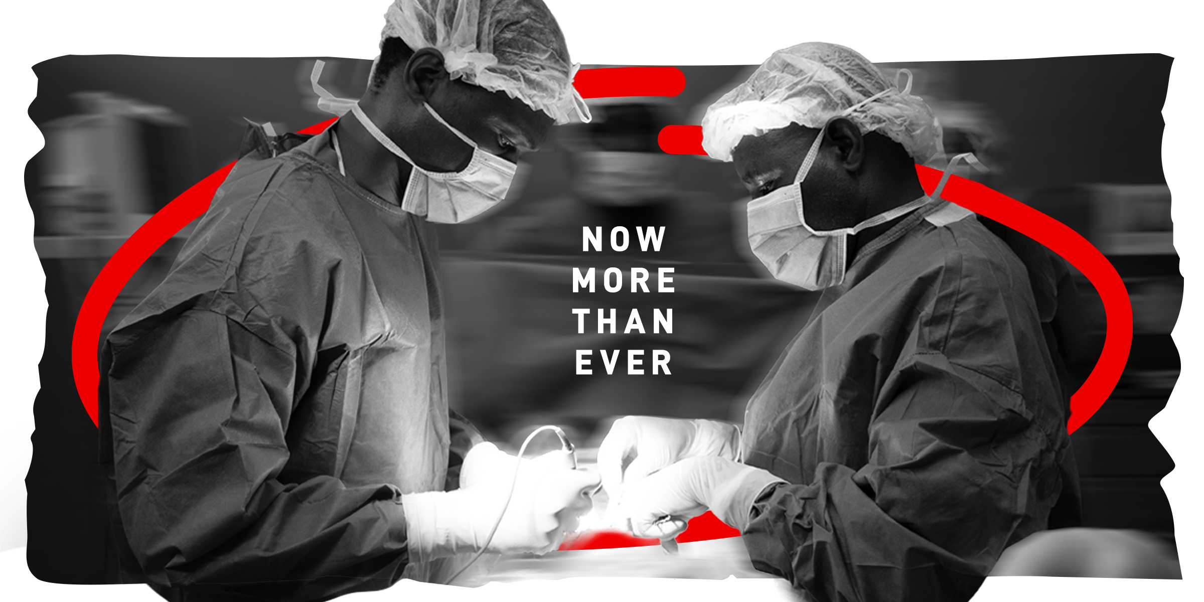 Two surgeons wearing masks and gown perform surgery in an operating theatre in Rutshuru general reference hospital in Democratic Republic of Congo.